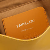 POSTINA® BABY BAG IN SMOOTH YELLOW SOLE LEATHER | Zanellato