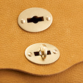 MEDIUM POSTINA® MESSENGER BAG IN NUBUCK LEATHER BROWN BRANDY | Zanellato