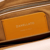 DOTTA® SMALL BAG IN HAMMERED LEATHER PINK CALLAS | Zanellato