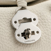 DOTTA® BABY BAG IN HAMMERED LEATHER WHITE D'ALBA | Zanellato