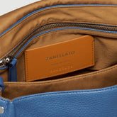 POSTINA® SMALL BAG IN HAMMERED LEATHER, BLUE ELBA ISLAND | Zanellato