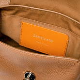 BORSA POSTINA® BABY IN PELLE MARTELLATA BROWN CANTUCCI | Zanellato