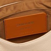 POSTINA® BABY BAG IN HAMMERED LEATHER PINK ROSE RO | Zanellato