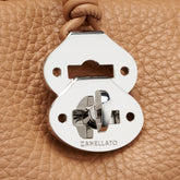 SMALL DOTTA® BAG IN TUMBLED LEATHER BROWN AMARETTO | Zanellato