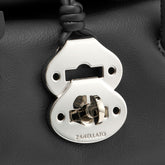 DOTTA® BABY BAG IN SMOOTH BLACK LAVAGNA LEATHER | Zanellato